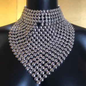 A CHROME GLADIATOR STYLE NECKPIECE